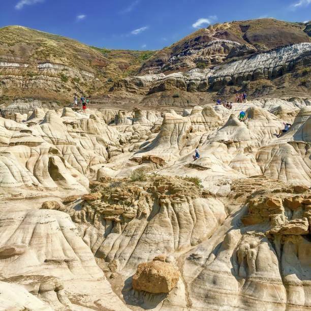 People walking the Hoodoos Trail in Drumheller, Alberta. Taken in the summer of 2017.