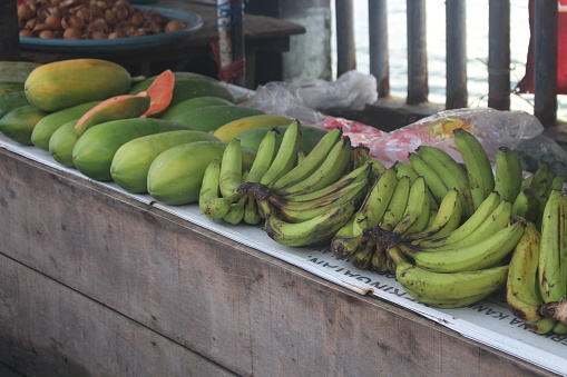 Open air fruit market with bananas