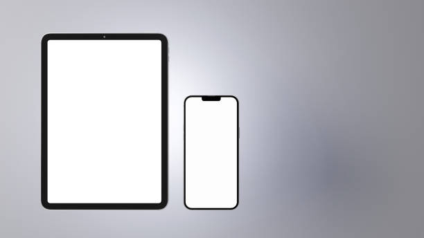 istock Mock-up of tablet and smartphone with white screens. 1415806719