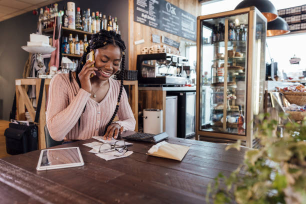 istock Businesswoman Calculating Her Finances 1415809845