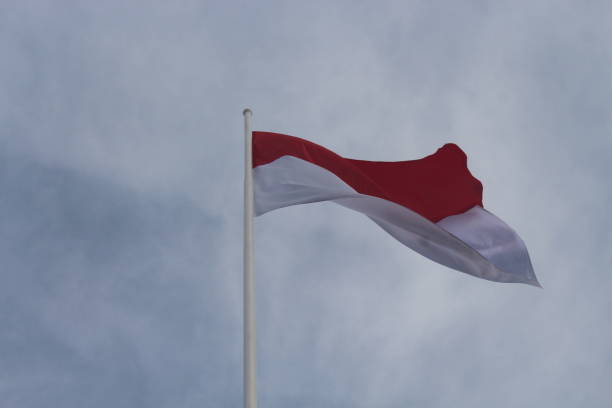 the red and white flag is flying
