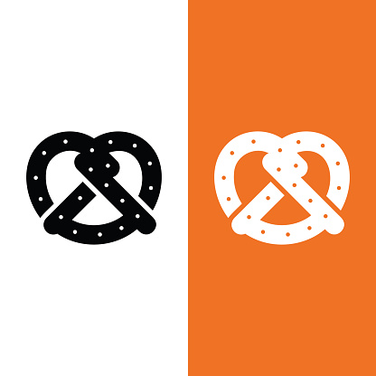 Pretzel Vector Icon in Glyph Style. Pretzel, a brittle, glazed-and-salted cracker of German or Alsatian origin. Vector illustration icon can be used for an app, website, or part of a .