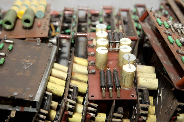 istock Electrician engineer work tester measuring voltage and current of power electric line in electical cabinet control.and wires on relay protection system. Bay control unit. Medium voltage switchgear. 1415813574