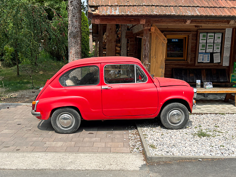 Varpolje, Slovenië - August 7, 2022: Red Zastava 750 LE. Nobody in the vehicle.