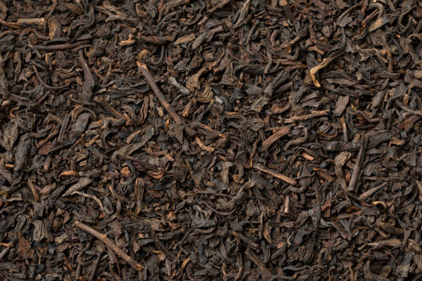 istock Chinese Pu Ehr dried tea leaves close up full frame 1415814312