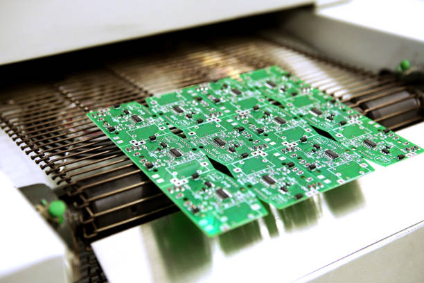 istock PCB drying technology. The finished board leaves the drying oven along the conveyor. 1415815190