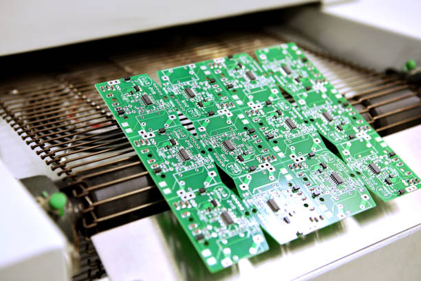 istock PCB drying technology. The finished board leaves the drying oven along the conveyor. 1415815202