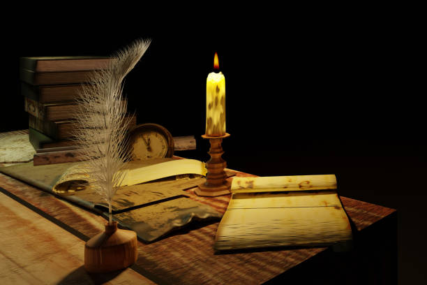 istock Old books and paper with candlelight. 1415819238