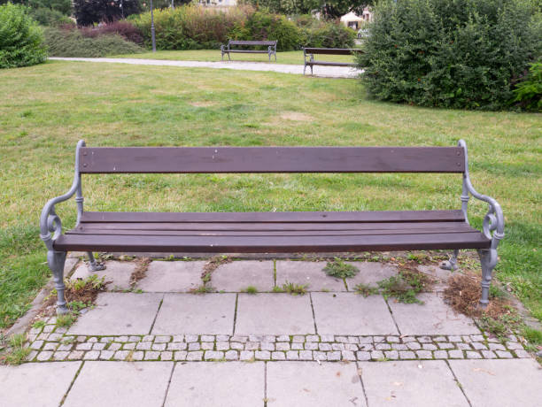 istock Bench in the city park. 1415820584