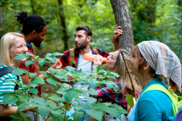 istock Diverse Friends in the forest walk 1415821416