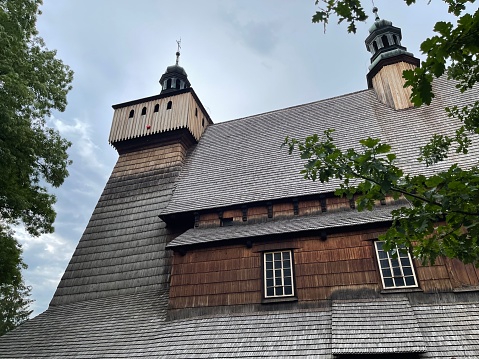 Church of the Assumption of Holy Mary and St. Michael's Archangel, in Haczów (Poland), the oldest wooden gothic temples in Europe, erected in the 14th century, on the UNESCO list of World Heritage Sites since 2003.