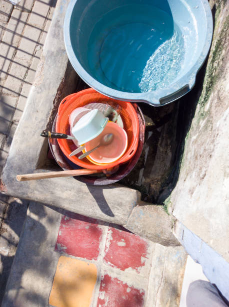 istock pile of unwashed dirty dishes 1415828066