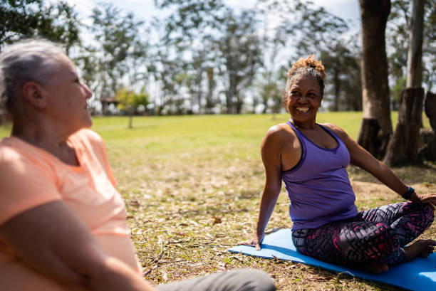 istock Senior women talking in a park 1415828193