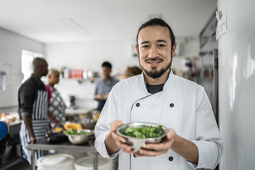 Portrait of chef in a kitchen during a cooking class