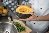 Chef holding a pumpkin