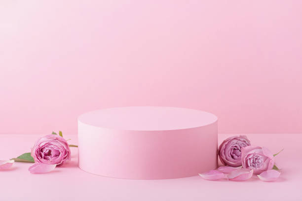 istock Pink background with roses and leaves 1415834736