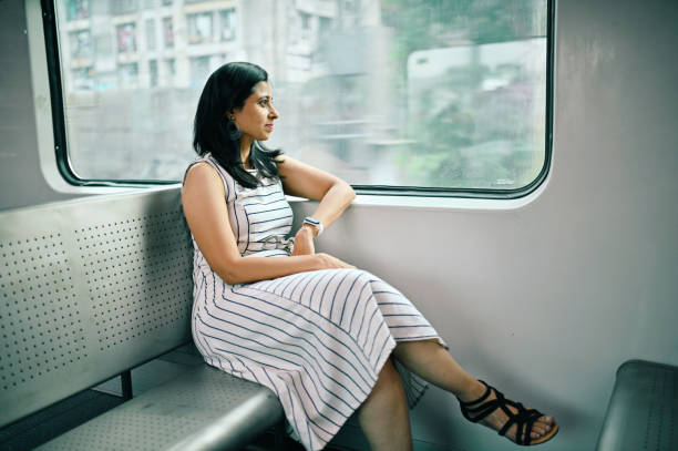 istock Woman enjoying a train journey 1415837539