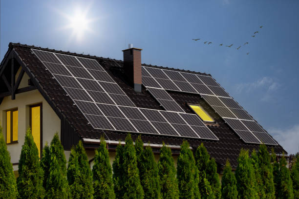 istock Roof covered with solar panels on modern house . 1415837965