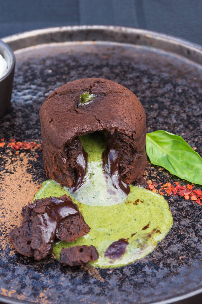istock lava cake. Chocolate fondant with basil ganache. 1415841643