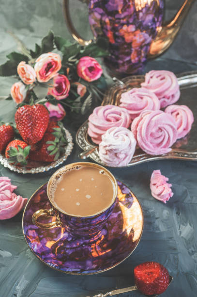 istock Beautiful vintage coffee Cup and handmade marshmallows on the table. Home baking is the decoration of the table. 1415841650