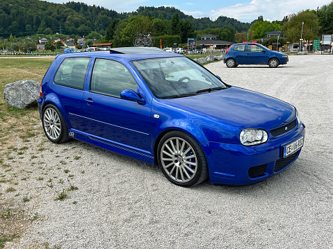 Velenje, Slovenia - August 12, 2022: Blue Volkswagen Golf 4 pakkerd on a public parking lot. Nobody in the vechicle.