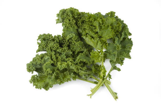 istock Kale leaves on white background isolated with clipping path. falt lay. 1415846817