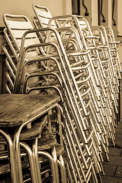 istock table and chairs at a sidewalk cafe 1415847422