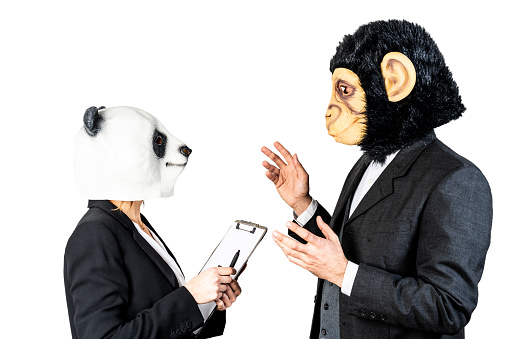 Entrepreneurs or colleagues doing business. Abstract concept with animal masks and businessman clothes