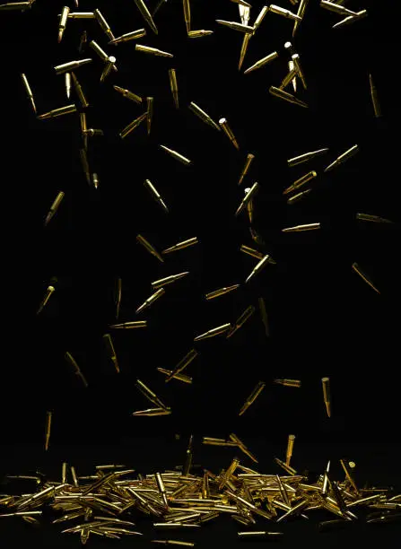 Vertical digital 3D rendering of many rifle bullets falling on a floor collecting into a pile