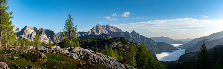 Mount Watzmann in National Park Berchtesgaden at sunrise. Lake Königssee under fog-cover,