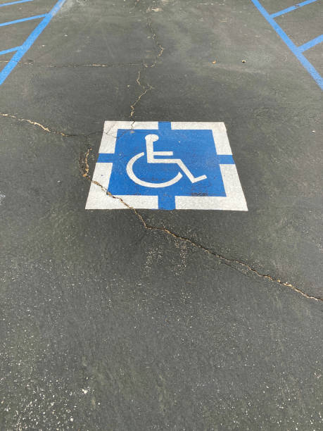 parking lot designated sign posted disable space commercial disabled entrance handicap car park building stock photo