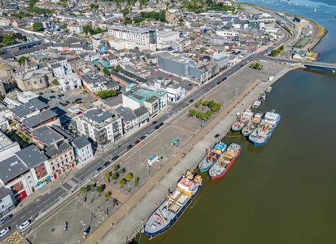 Wexford, Ireland. 7 August 2022. Aerial view of fishing trawlers at the quay in Wexford, Ireland