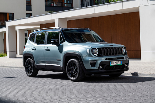 Berlin, Germany - 15 July, 2022: Jeep Renegade e-Hybrid stopped on a street. This car is the smallest vehicle in Jeep offer.