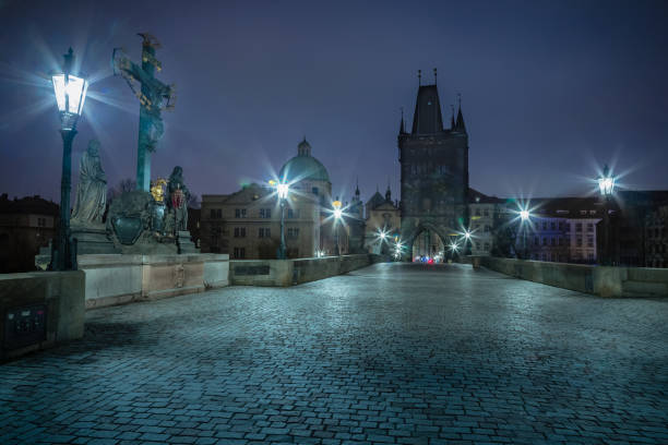 istock Charles bridge illuminated at dawn, Medieval Prague, Czech Republic 1415861659