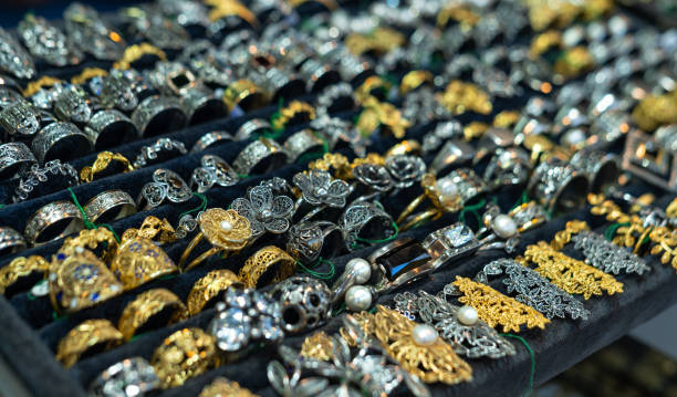 istock Gold and silver jewelry in store window display 1415862651