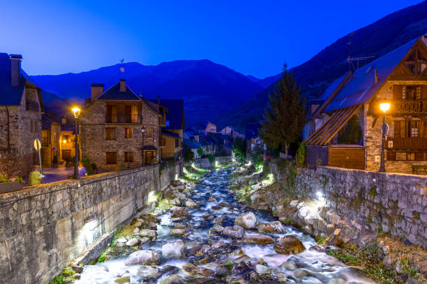 Vielha in Pyrenees mountain, Nere river, by night, Catalonia province, Spain