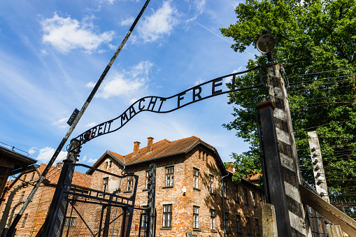 Main gates to Auschwitz-Birkenau concentration camp. Auschwitz, Poland, 17 July 2022.