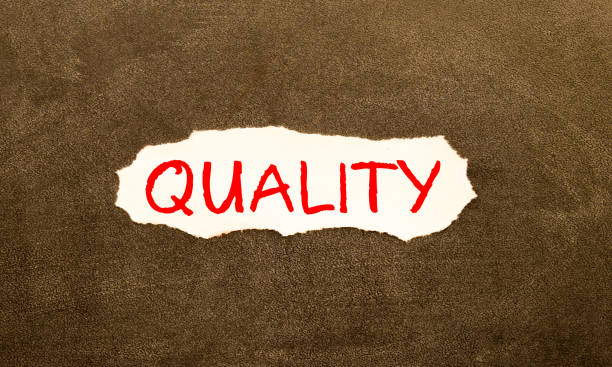 istock word QUALITY on white torn paper, concept 1415871691