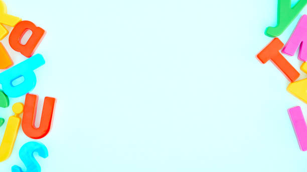 istock Alphabet letters on a blue background with space for copy 1415879251