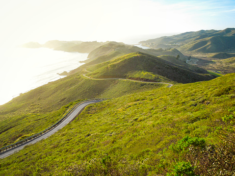 Dramatic view of the sun setting on the road to Point Bonita Lighthouse.  This point is just across the Golden Gate Bridge from San Fransisco, California