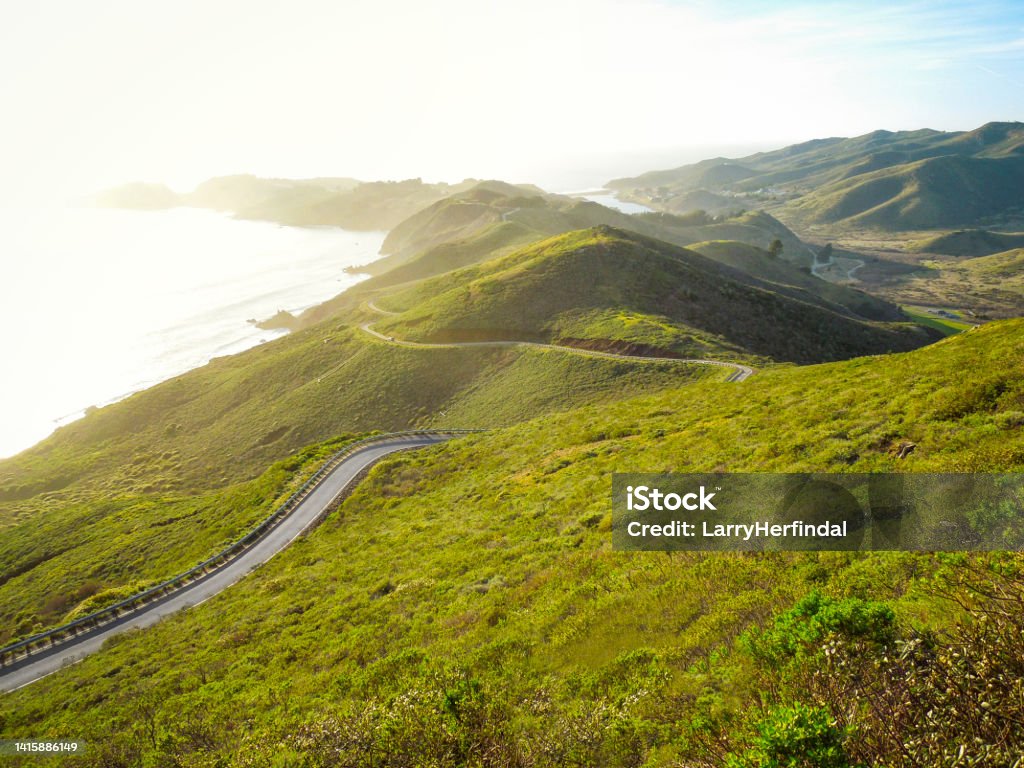 Sunset Road to Poiint Bonita Dramatic view of the sun setting on the road to Point Bonita Lighthouse.  This point is just across the Golden Gate Bridge from San Fransisco, California San Francisco - California Stock Photo