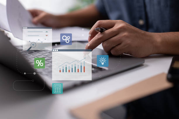 istock e-learning programs and consultancy for company management. analyzing financial charts and executive networking. 1415892502