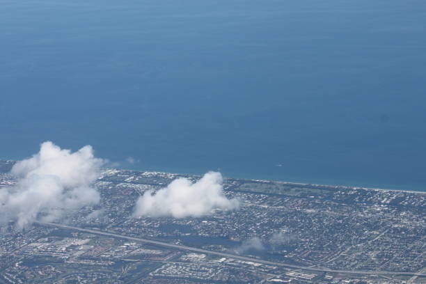 istock Airplane View of the Clouds 1415895769