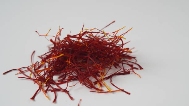 istock Expensive Red Dried saffron spice on white background 1415911358
