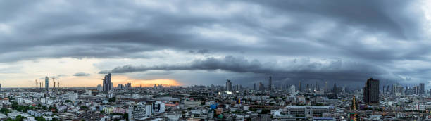 istock Modern city under dramatic stormy rainy clouds. 1415911907