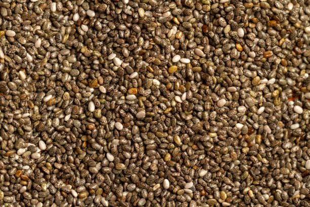 istock wooden spoon and chia seeds 1415914567