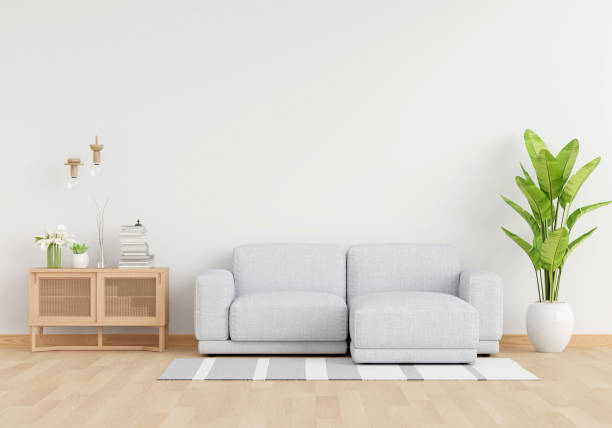 istock Grey sofa in white living room with copy space, 3D rendering 1415922133