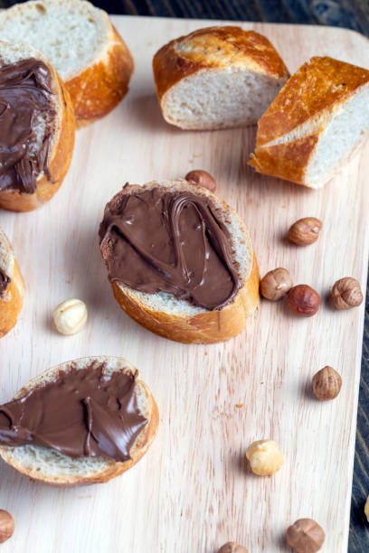 istock chocolate butter spread on a baguette, close up 1415922328