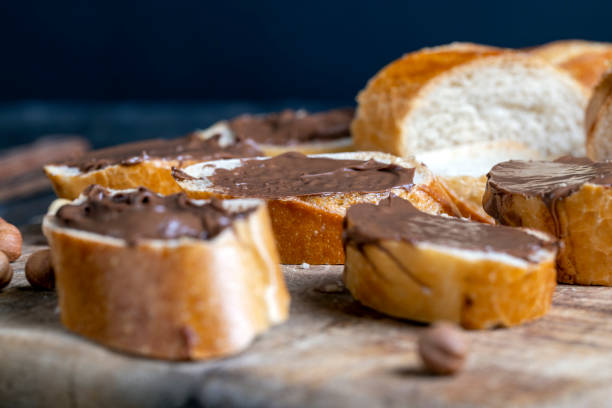 chocolate butter spread on a baguette, close up