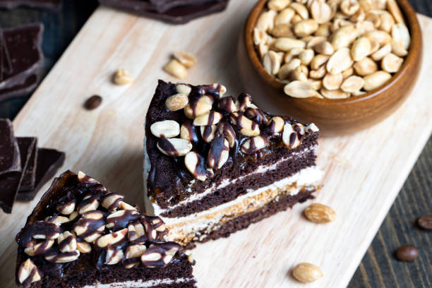 istock chocolate cake with nut filling and peanuts 1415922408